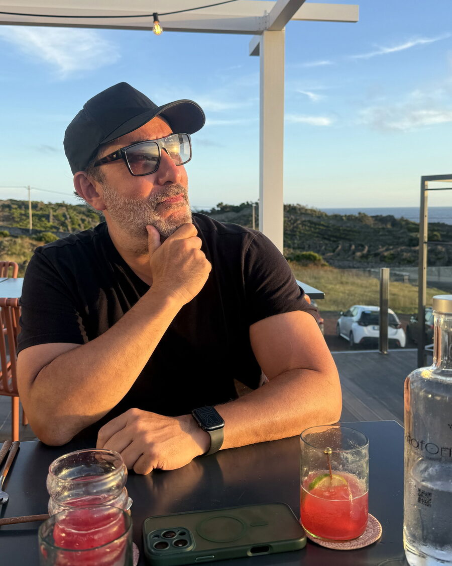 Joe Bernik at a seaside terrace at sunset