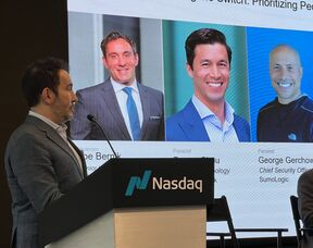Joe Bernik moderating a panel at Nasdaq